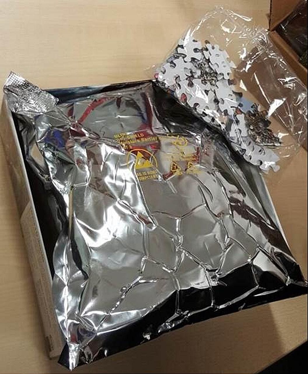 CNB officers were alerted to a parcel suspected of containing about 136g of cannabis on Friday.