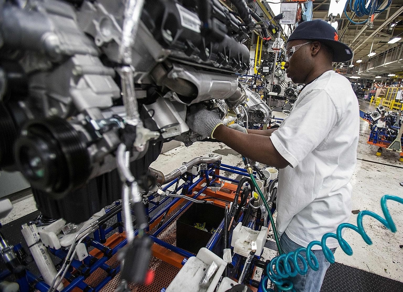 The assembly line for Chrysler cars at the Jefferson North Assembly Plant in Detroit, Michigan. The narrative that "good jobs" in US manufacturing have been "lost" to competition from imports does not fit the facts, as imports create jobs too, says t