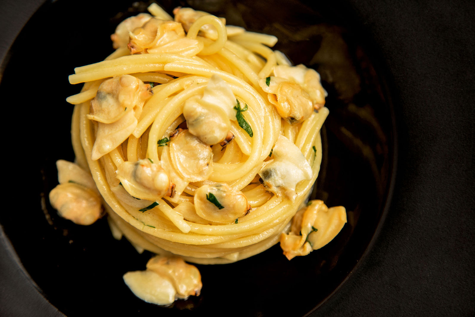 Artisanal spaghetti and dry sake-drizzled vongoleveraci (clams). PHOTO: AMERICAN EXPRESS