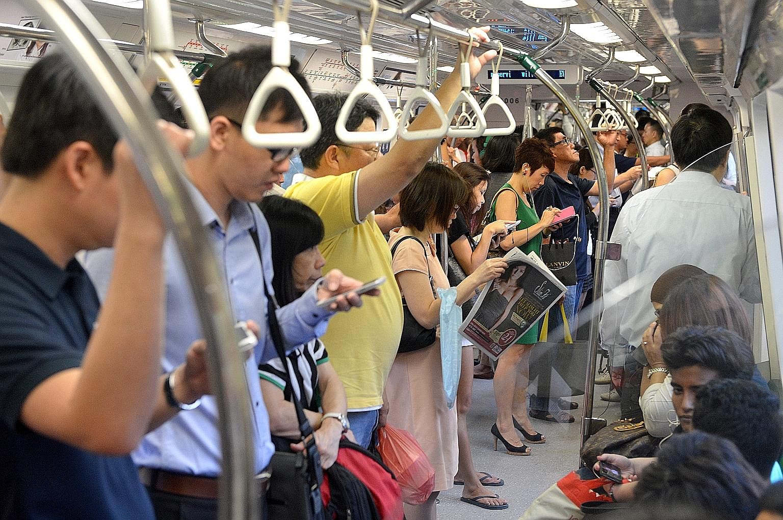 Grab poles in the train cabins are attached to the train's interior and not connected to the external frame, according to SMRT in a blog post last year. Even if a commuter is holding onto one when lightning hits, he would be unaffected.