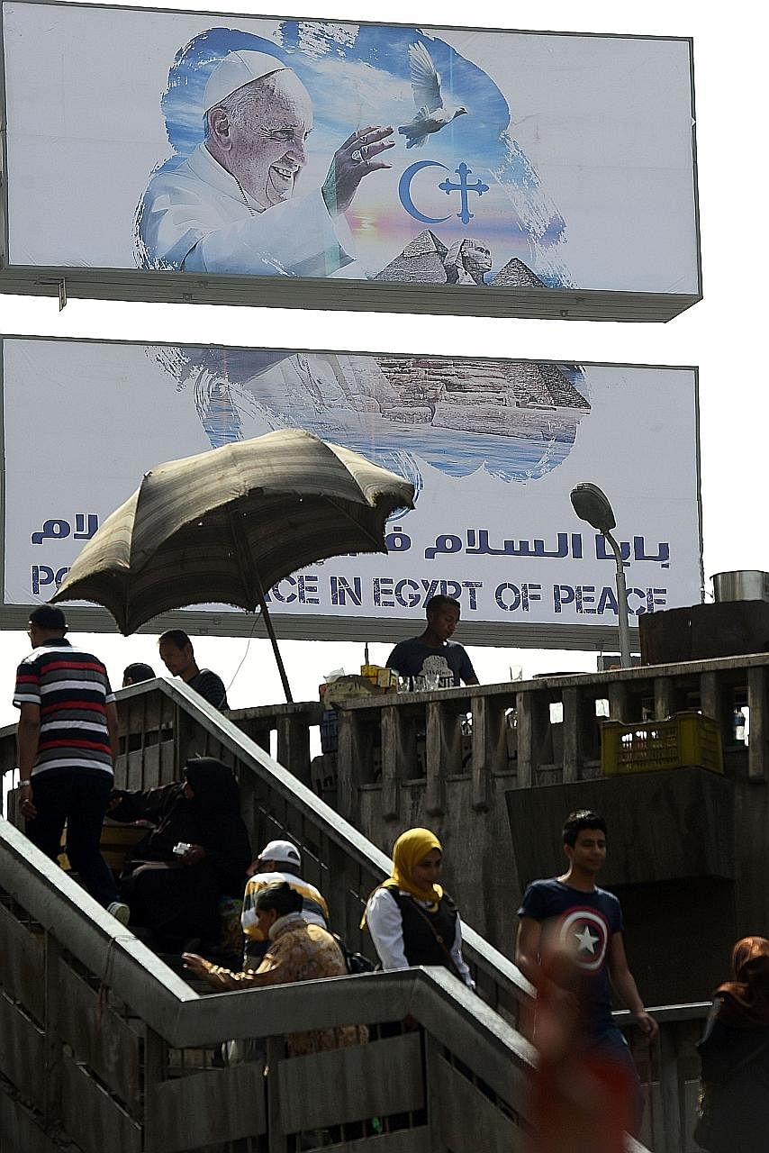A banner welcoming Pope Francis in Cairo. The Pope hopes his visit would encourage reconciliation with the Islamic world.