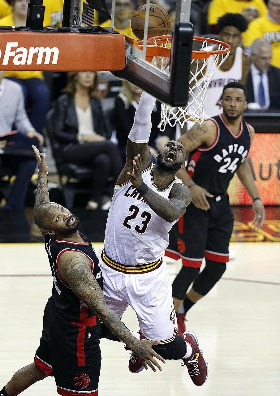 Cleveland Cavaliers star LeBron James trying for a lay-up in the first half of their NBA East semi-finals Game One clash against the Toronto Raptors. James had 35 points to lead the Cavs to victory.
