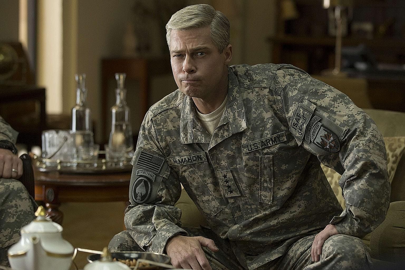 Dwayne Johnson and Zac Efron in the Baywatch reboot, and Brad Pitt (above) as a general in War Machine.