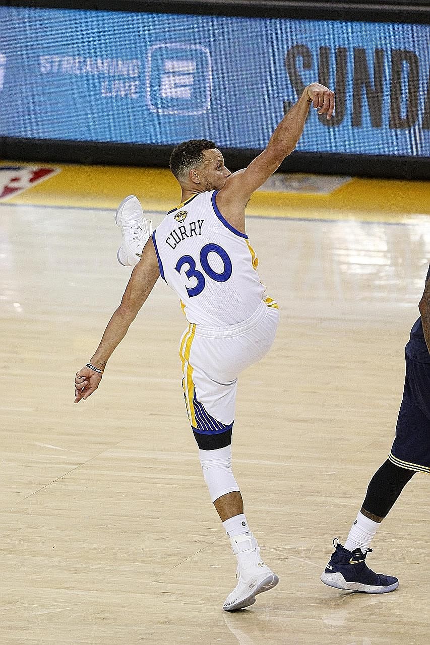Warriors' Stephen Curry celebrating after draining a three-point jumper in Golden State's 113-91 win over Cleveland in Game One of the NBA Finals. With the guard fully fit, the Cavs have their work cut out for them in the rest of the series.