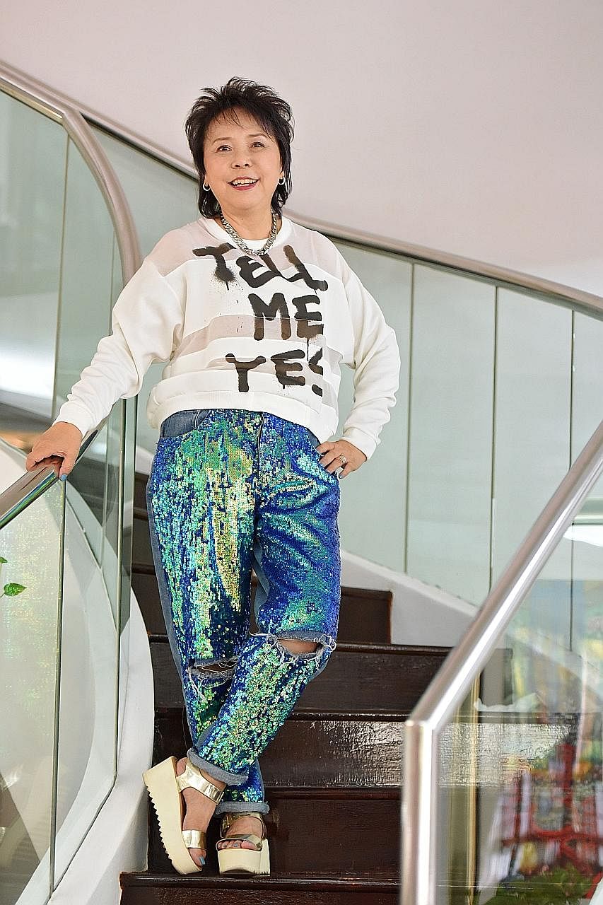 Ms Esther Tay pairs her pants with street-style jumpers and jackets with a grunge vibe for a less corporate look. Ms Jessie Chng is an avid shopper and frequents the malls in Orchard Road. Mr Francisco Raquiza favours long structural tops, wide black
