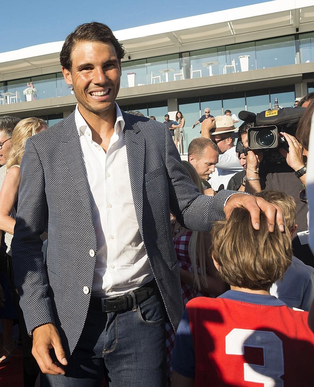 Rafael Nadal attending a graduation ceremony of pupils of the American International School of Mallorca in his tennis academy on Tuesday. The Spaniard had clinched his 10th French Open title on Sunday.