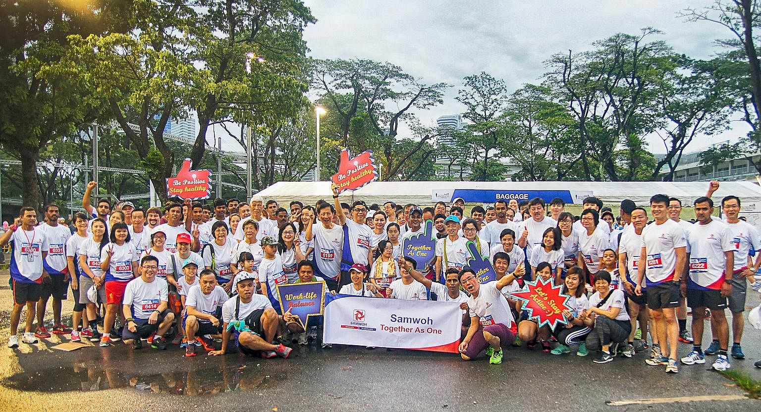 Samwoh employees at last year's ST Run. The firm is participating in the event for the second year running.