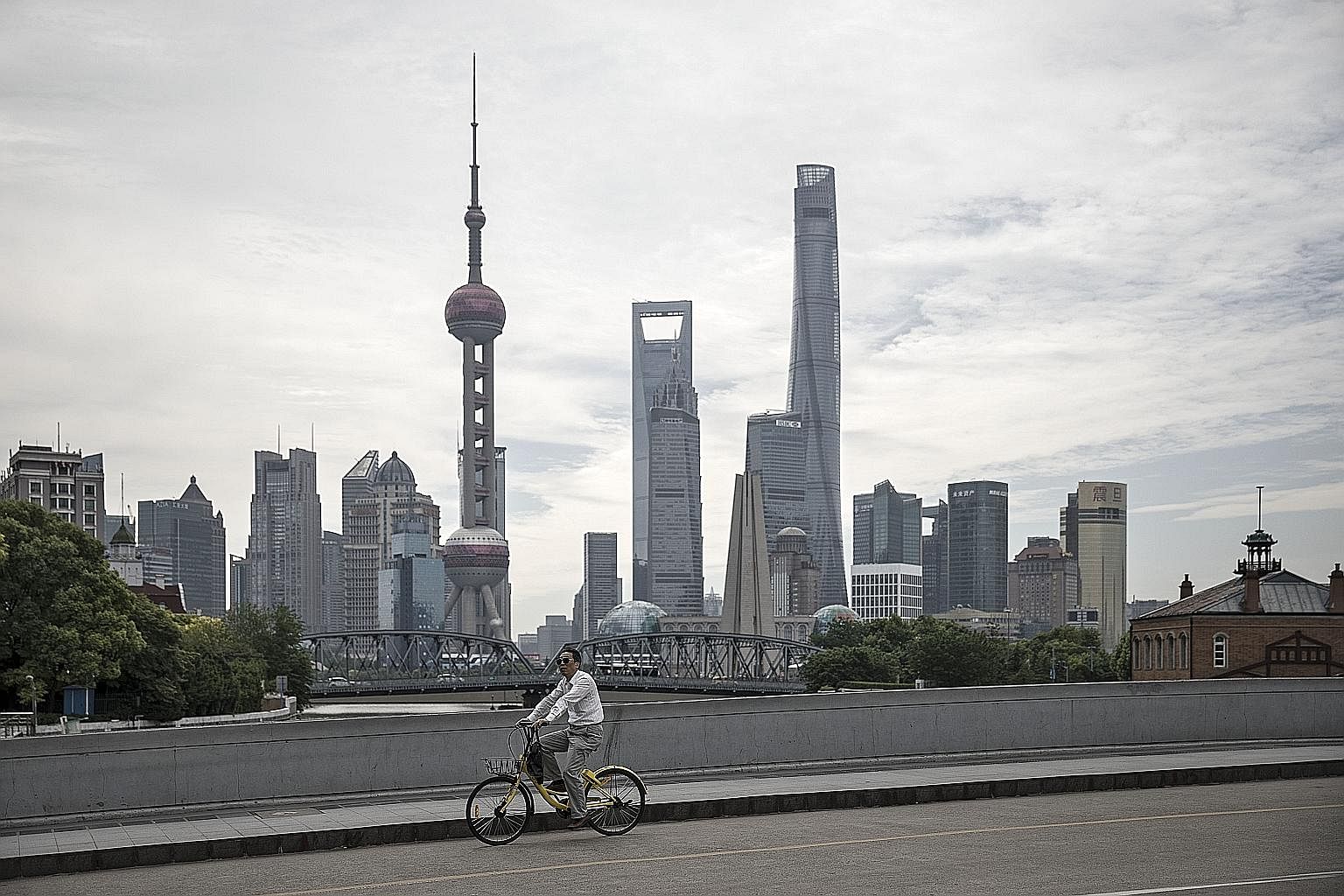 Shanghai, which has some of the world's tallest towers, is facing the growing problem of filling them as China's real estate market undergoes changes.
