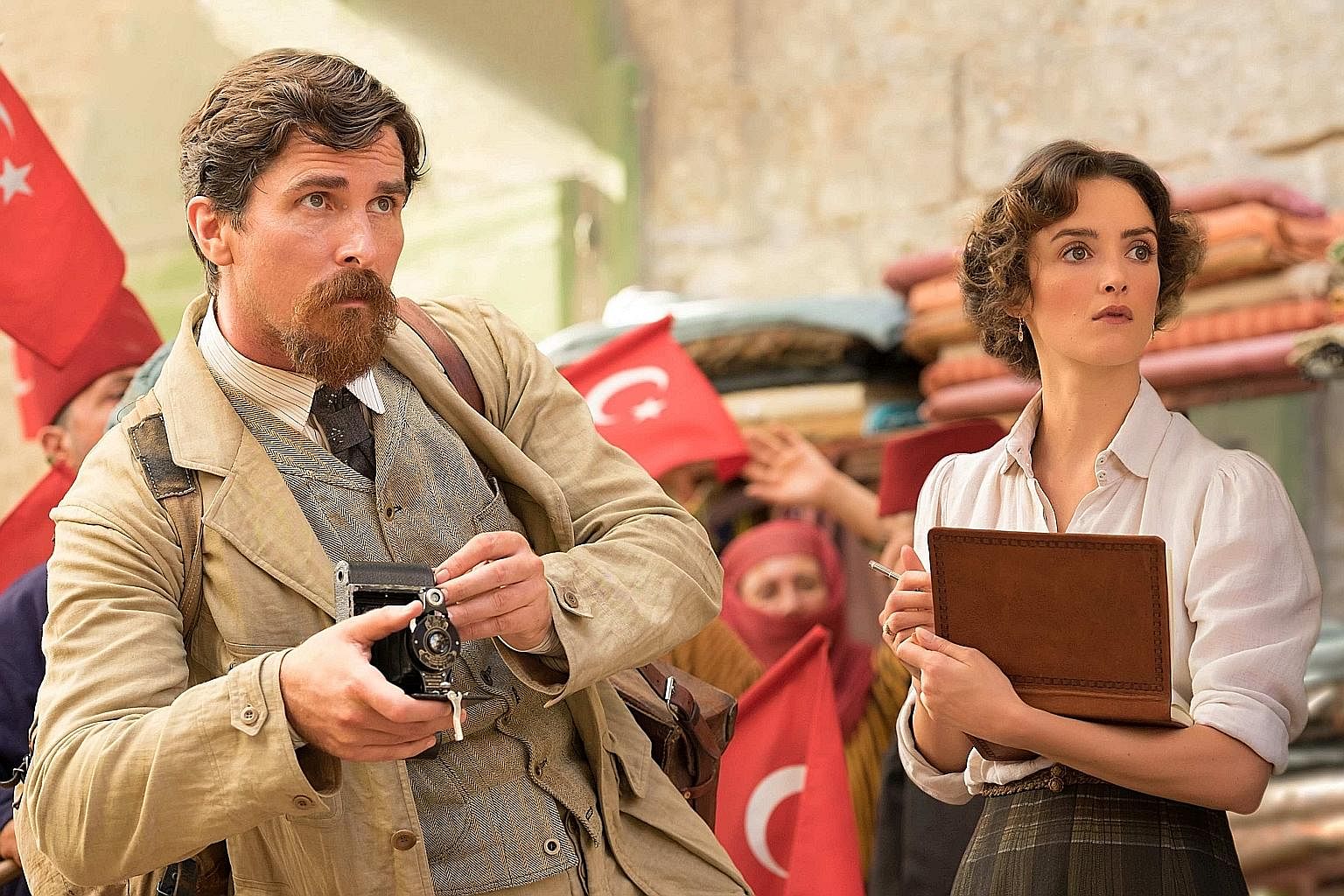 Christian Bale and Charlotte Le Bon (both above) in The Promise.