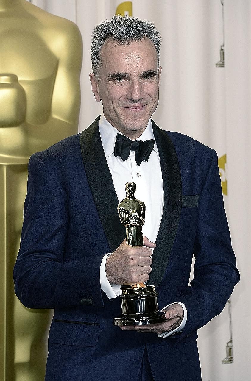Daniel Day-Lewis with the Best Actor Oscar he won in 2013 for his portrayal of American President Abraham Lincoln in Lincoln.