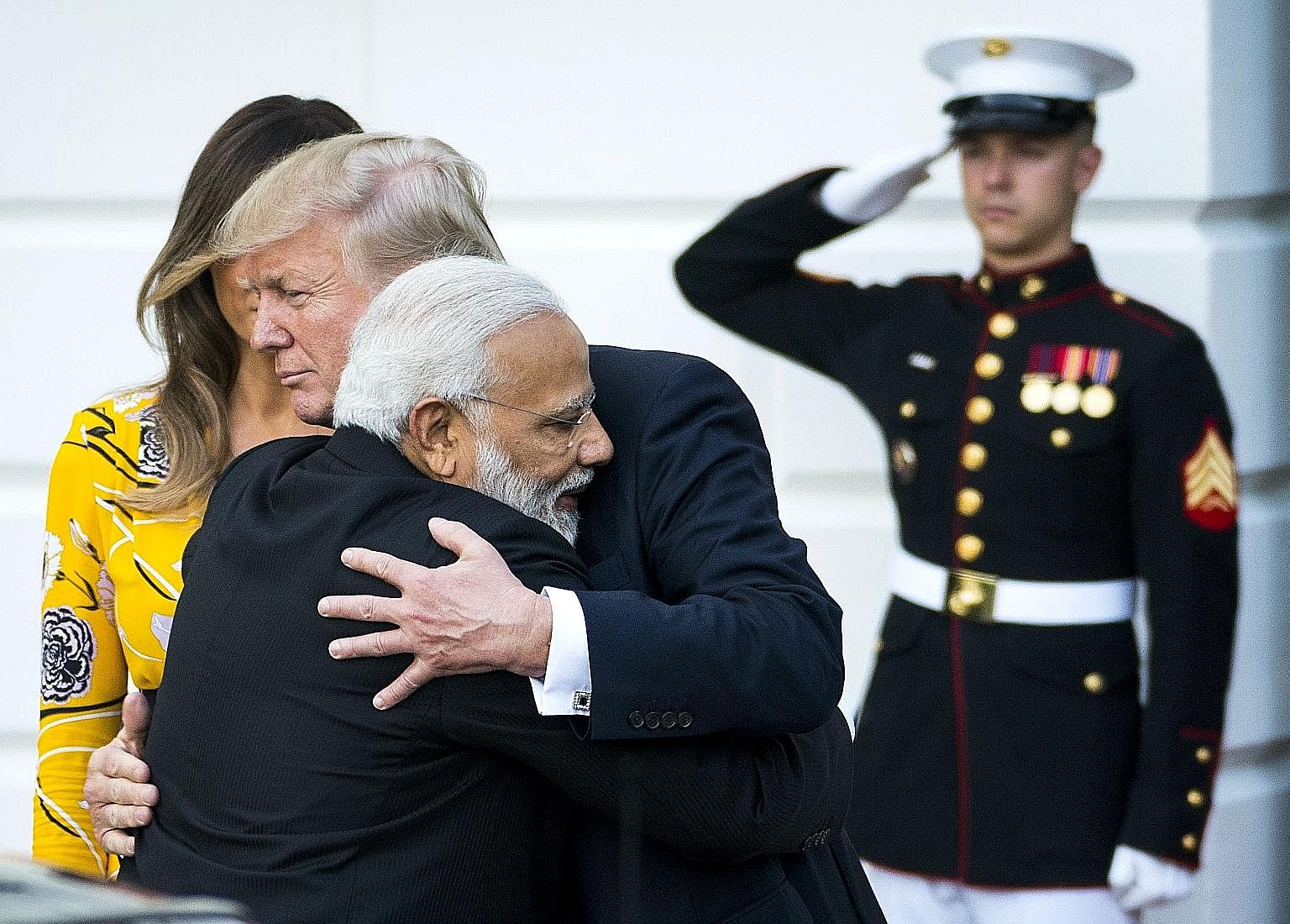 Indian Prime Minister Narendra Modi and US President Donald Trump exchanging a hug following their dinner at the White House on Monday. The Indian leader is known to hug leaders he gets on with.