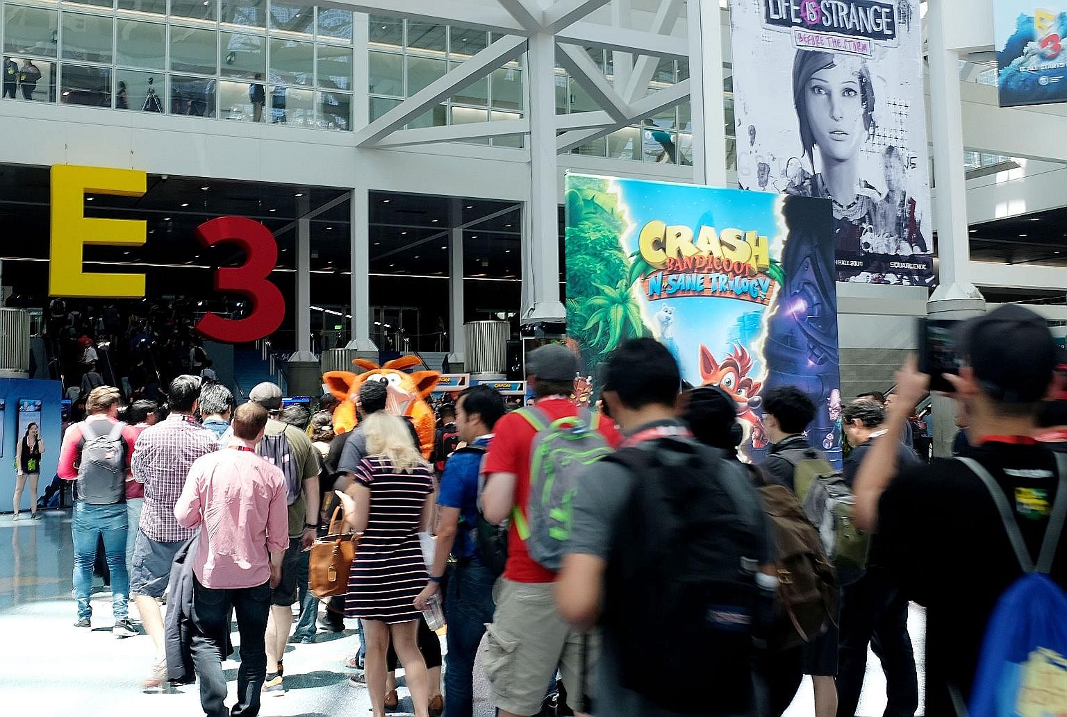 Visitors to the Electronic Entertainment Expo gaming convention queuing up to enter the exhibition hall at the Los Angeles Convention Center on June 15. It was the first time in its 22-year history that E3 had opened the show to the public.
