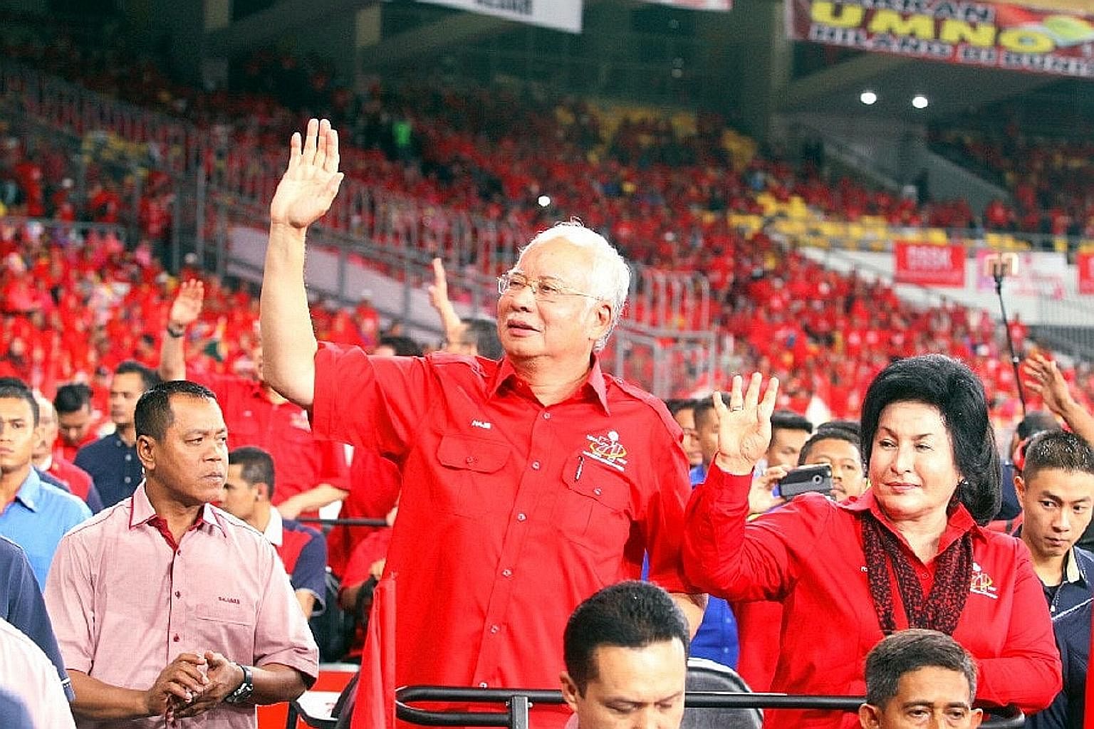 Malaysian Prime Minister Najib Razak and his wife at the ruling Umno's 71st anniversary celebrations this year.