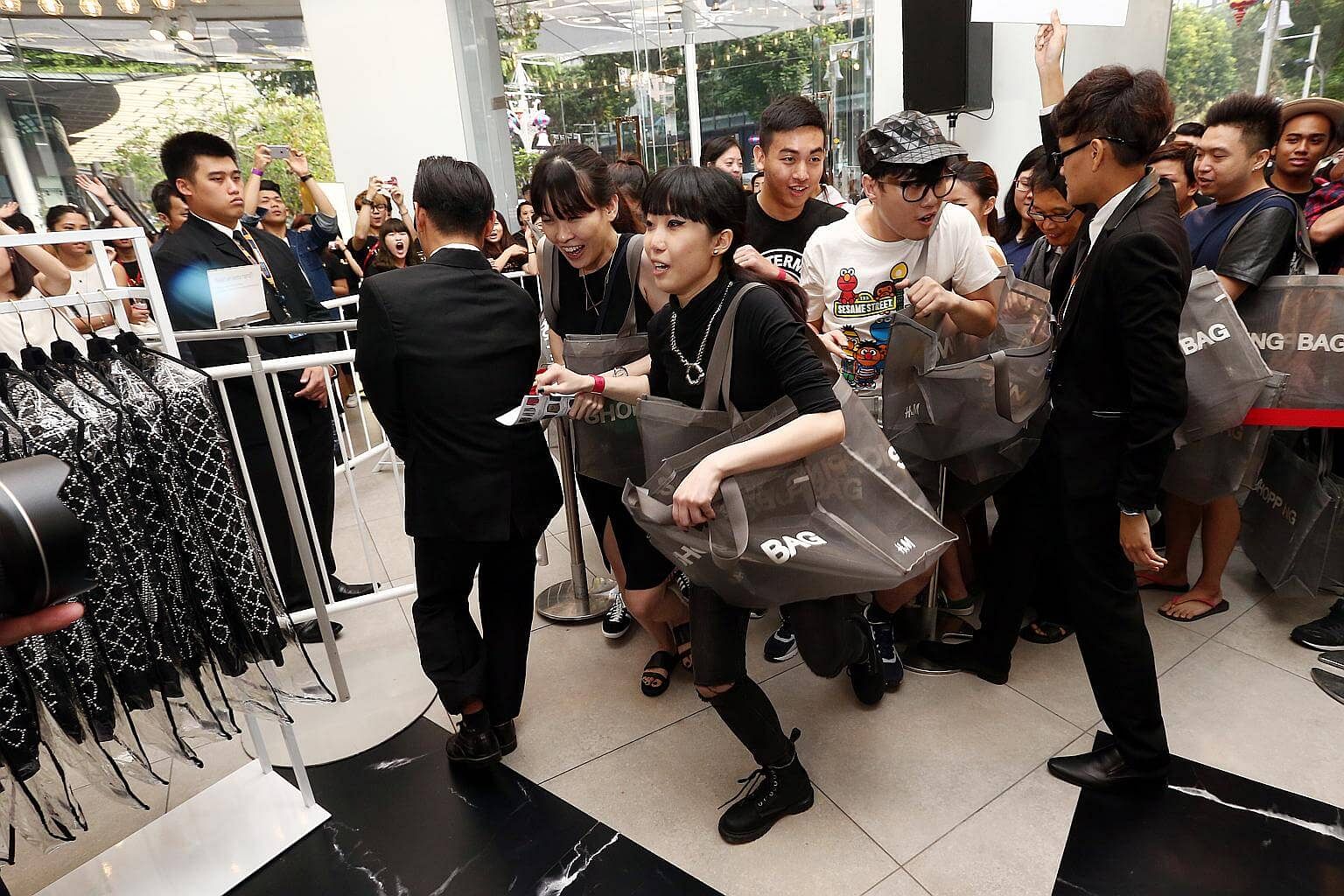 Excited fans queue overnight outside Ion Orchard for Louis Vuitton and  Supreme collaboration