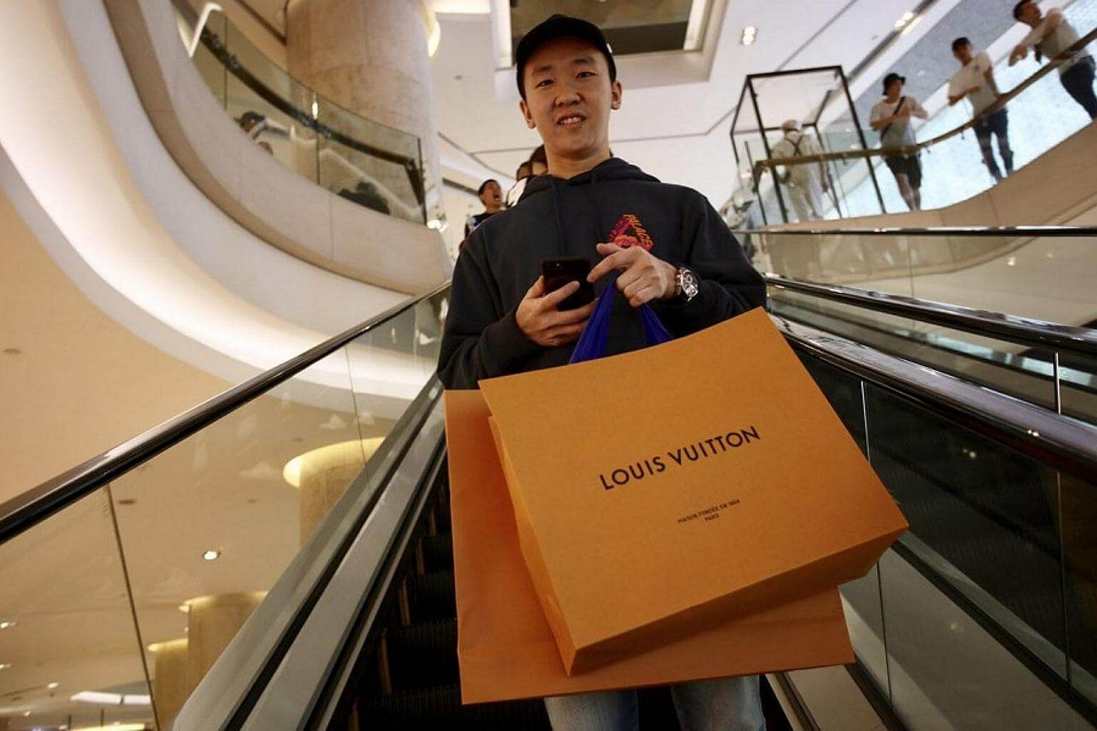 Excited fans queue overnight outside Ion Orchard for Louis Vuitton