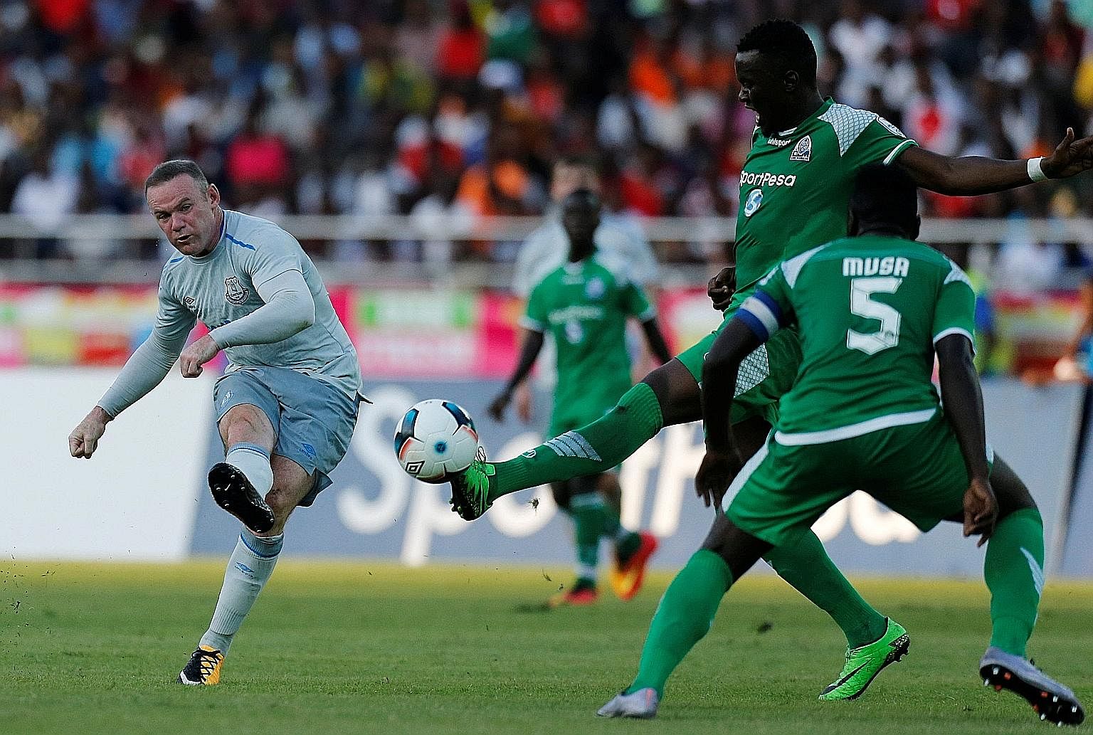 Wayne Rooney scoring Everton's first goal in their pre-season friendly against Kenya's Gor Mahia on Thursday. The Premier League club won 2-1 with teenager Kieran Dowell netting the winner. Rooney aside, Everton have been spending big this summer, si