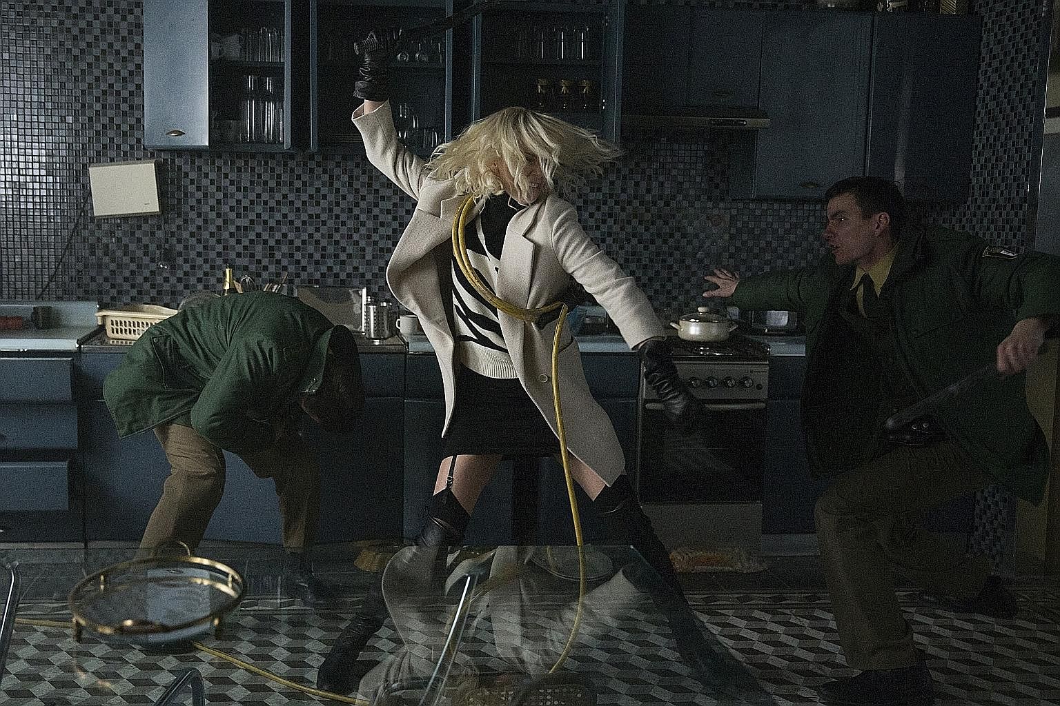 Charlize Theron (centre) as a British spy in Atomic Blonde.