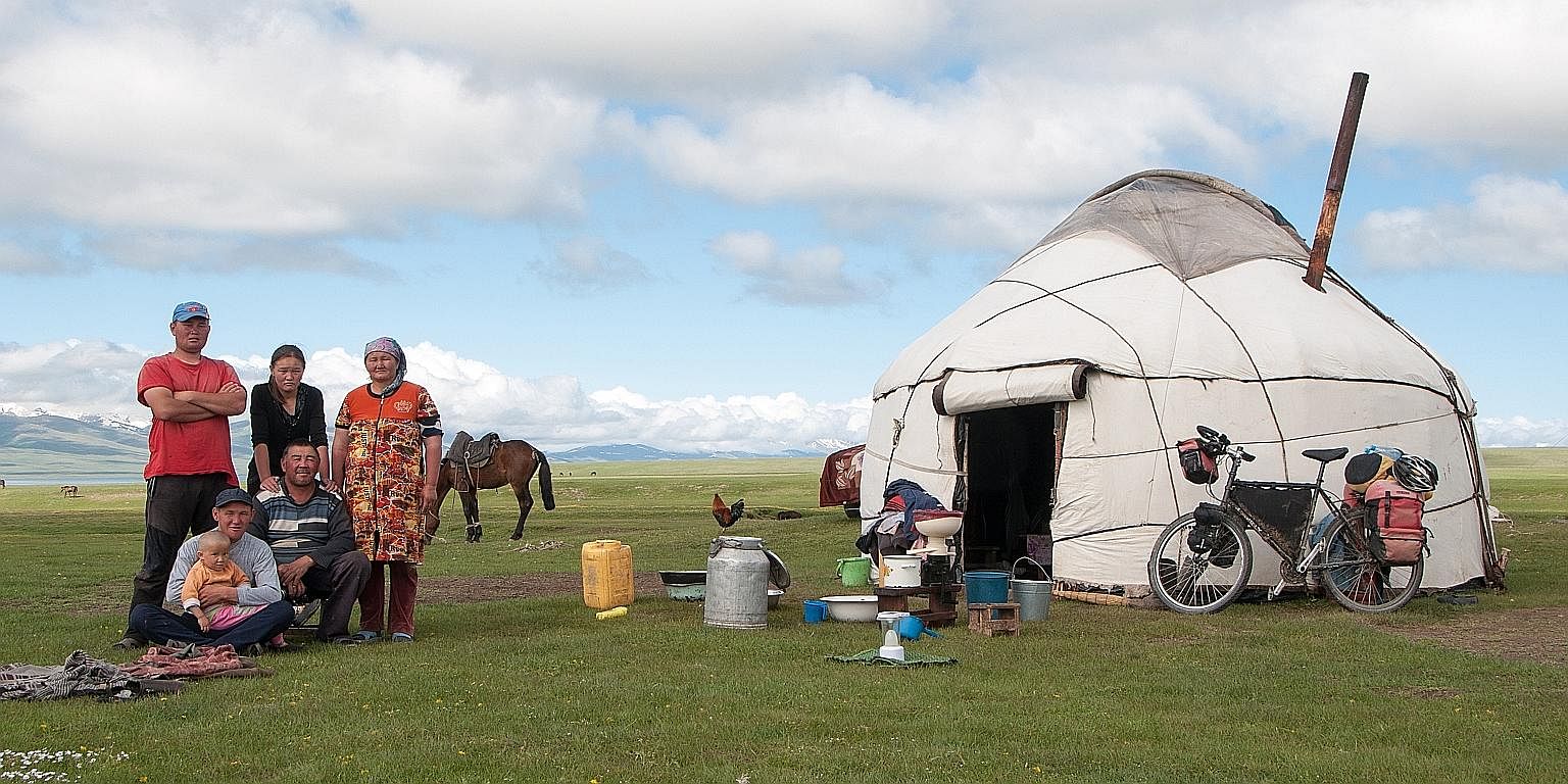 A Kyrgyz woman preparing lunch for the writer in her yurt, where he sought shelter, in eastern Tajikistan, near the Chinese border. Left: The writer approaching the highest point of the trip, the Ak-Baital Pass. Above: The Mug Teppe fortress in Istar