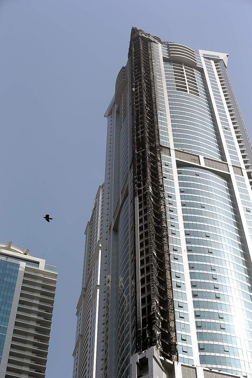 The Torch, one of the tallest towers in Dubai at 337m, after a fire ripped through it early yesterday morning.