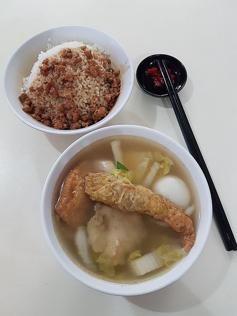 Long Hua's hearty Hakka Yong Tau Foo set comes with stuffed bittergourd, meat-filled tofu, fishball, meat fritter, tau kwa and rice or noodles.