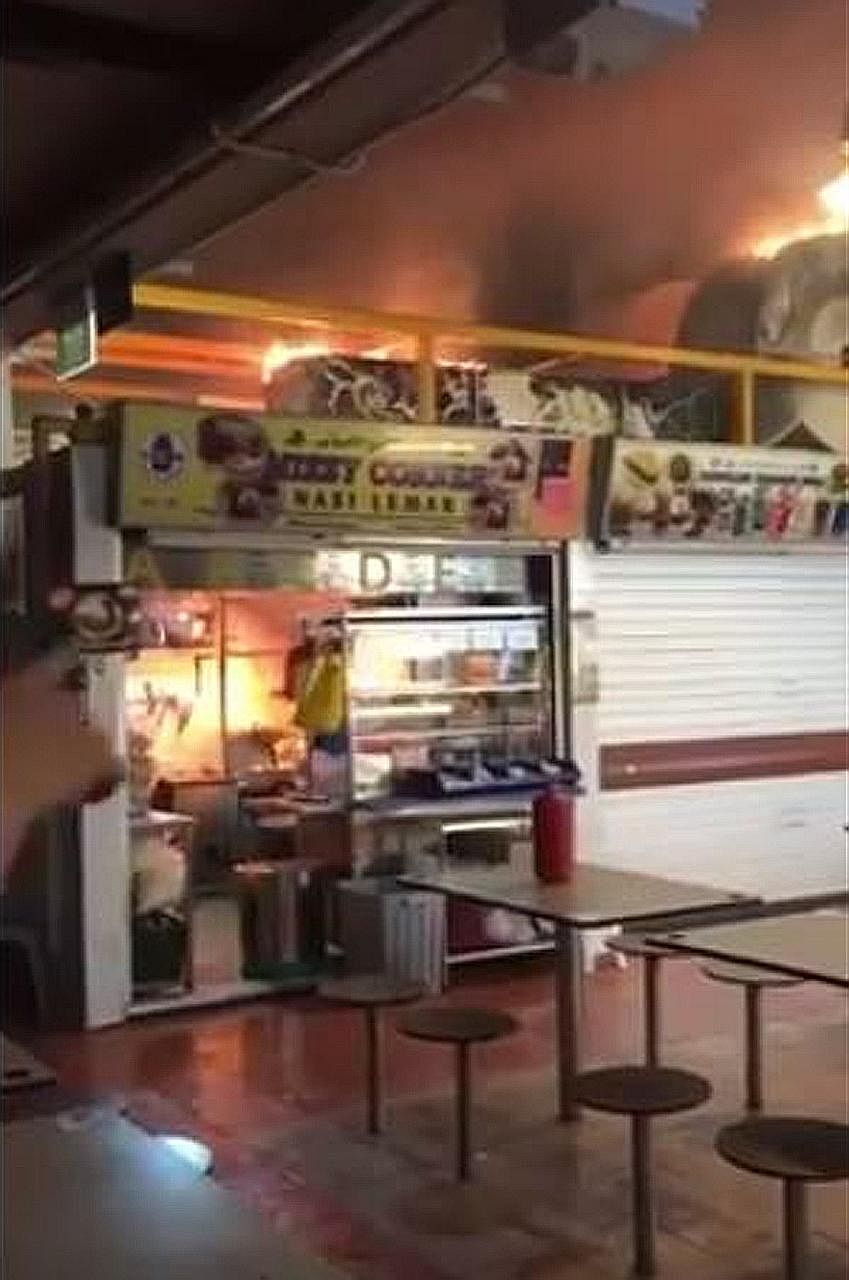 A video was uploaded online showing the fire razing the kitchen stove and exhaust ducting at Mizzy Corner Nasi Lemak at Changi Village.