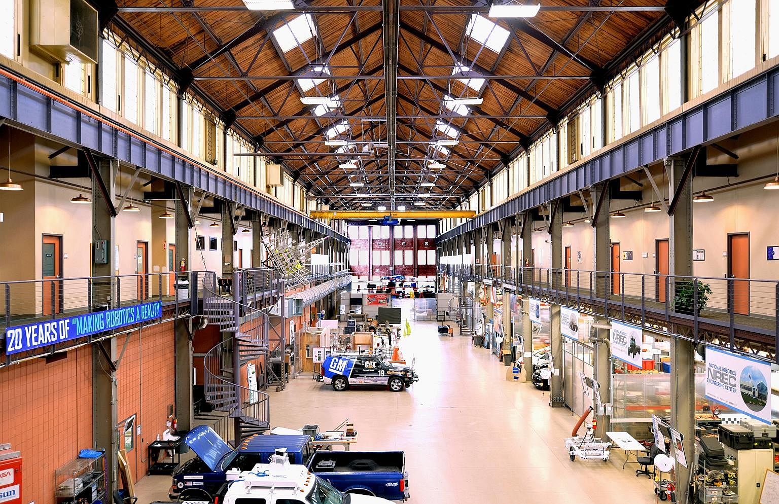 The Carnegie Mellon University's National Robotics Engineering Centre workshop gives an old steel mill new life. CMU's legacy of computer science education is at the heart of the city's tech-job boom.