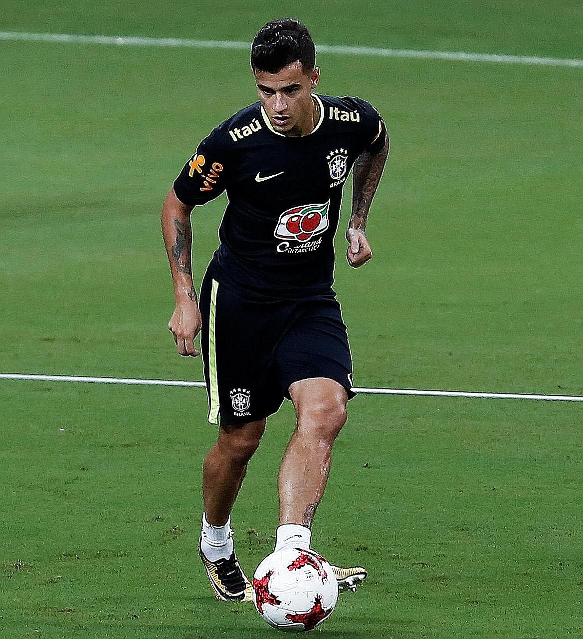 Philippe Coutinho training ahead of Brazil's World Cup qualifier against Colombia tomorrow. Having failed to obtain a move to Barcelona, he will need to work his way back into Liverpool's first team as they have impressed without him.