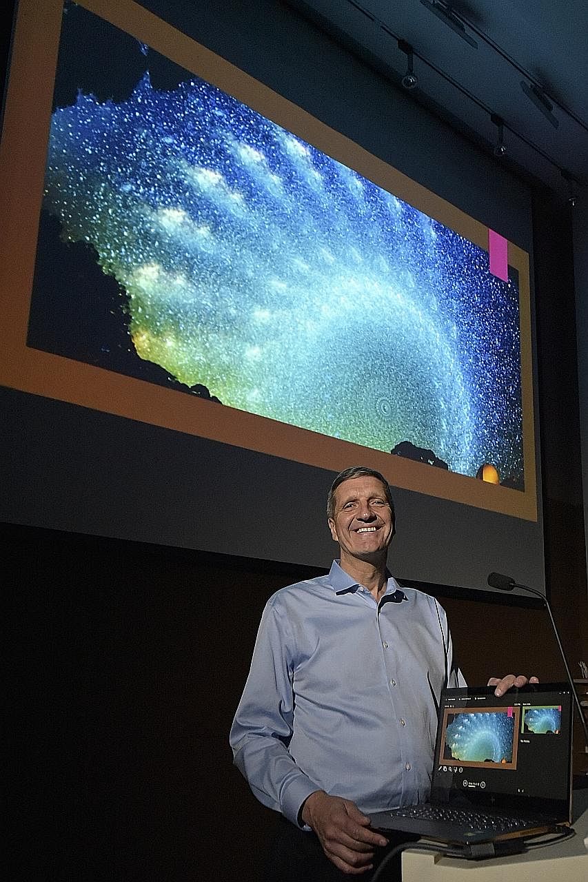 Dr Christian Sasse, whose composite photo of the Milky Way (projected on screen) went viral on social media this year, was in Singapore recently to speak at Visual SG, a visualisation festival.