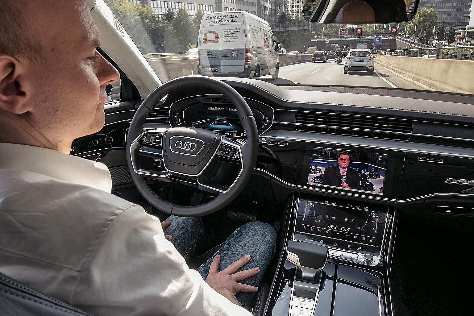 Audi A8's hands-free feature may allow the driver to watch a movie on the car's infotainment screen.