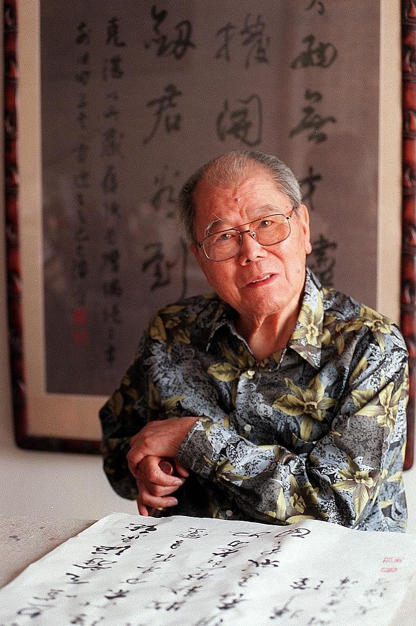 Artist Lim Yew Kuan, in a photo taken in the late 1990s, with a bronze bust of his father, Nafa founder and artist Lim Hak Tai.