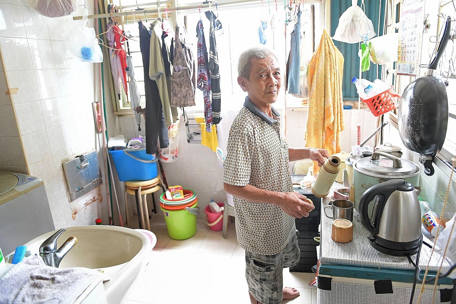 Mr Thio Sin Nam, a construction worker for most of his life, works today as a mason. The bachelor, who lives alone in his Kim Tian Road rental flat, has worked since he was just five.