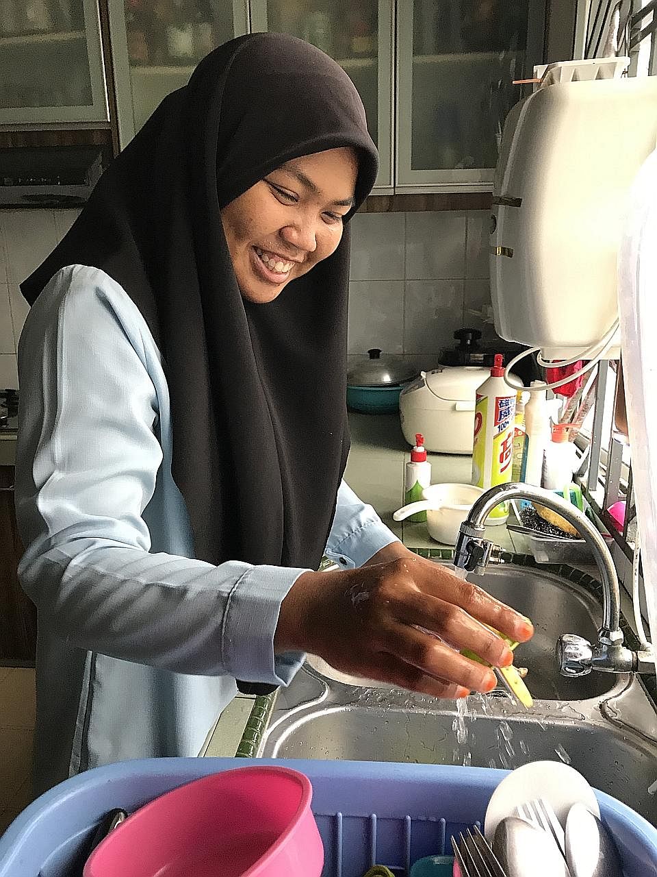 Ever since she started work two months ago, Ms Nor Asma has formed a strong bond with her employer's kids, especially Ahmad Willdan Arjuna Ahmad Fedtri, three. Ms Nor Asma Arifin, who was initially apprehensive about living with strangers, has adjust