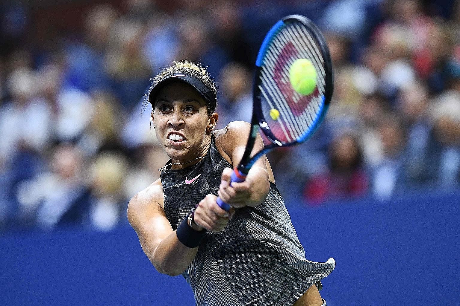 Madison Keys hitting a backhand en route to defeating fellow American CoCo Vandeweghe at the US Open to make her first Major final.