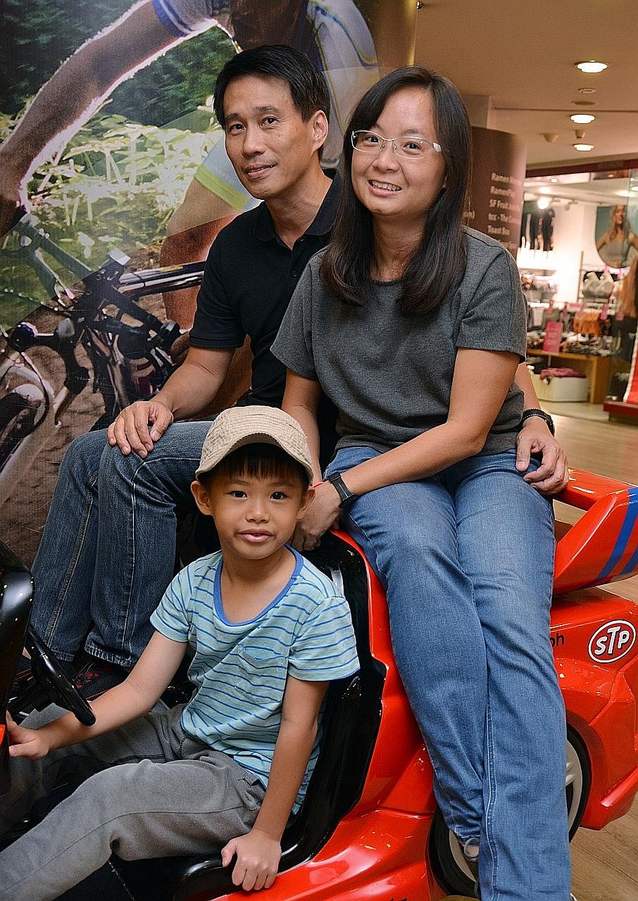 Mr Lucien Low, 54, with his wife Jocelyn Lau, 43, and their five-year-old son, Robin. Mr Vasu Menon, 53, with his wife Jean Lim, 40, and their daughters Natasha, two, and Alisha, four months.