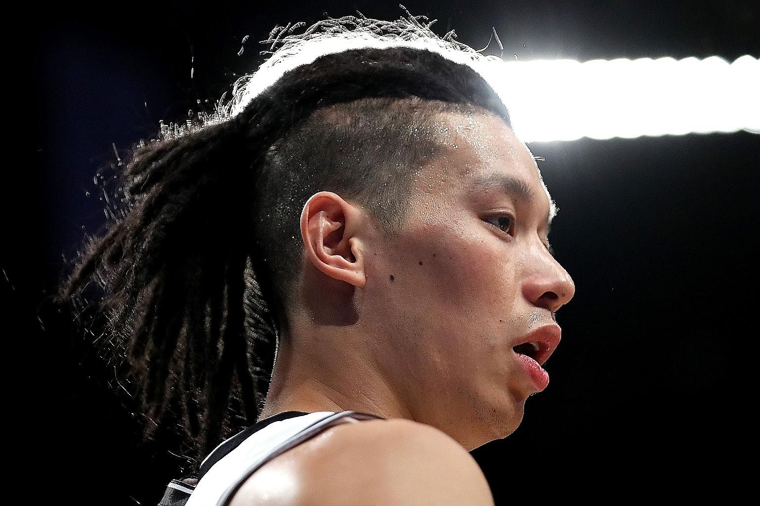 Jeremy Lin of the Brooklyn Nets with his dreadlocks hairdo against the Miami Heat in a pre-season game last Thursday. His measured response to accusations of cultural appropriation avoided a possible unsavoury spat.