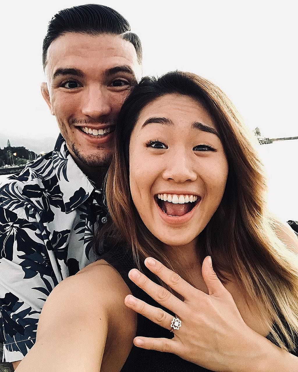Canadian One Championship star Angela Lee showing off her engagement ring after saying yes to Bruno Pucci at Beachhouse, North Shore, Haleiwa.