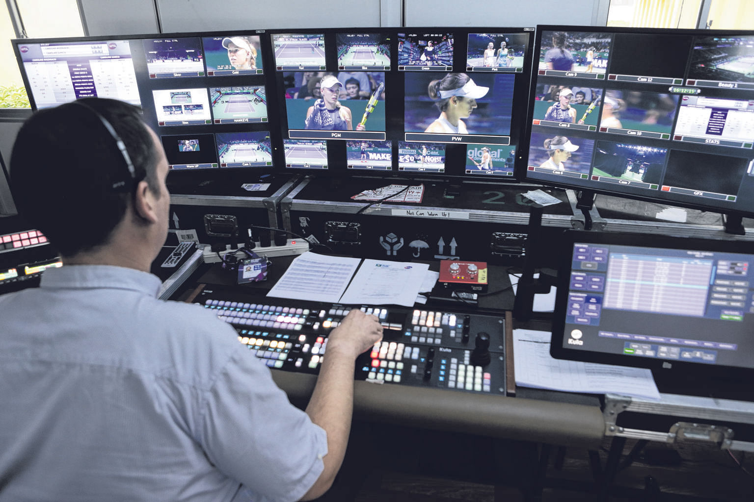 Nic Mills directing the broadcast of the match between Caroline Garcia and Caroline Wozniacki yesterday. The images are beamed to 38 international broadcasters worldwide by a team of over 50 people here.
