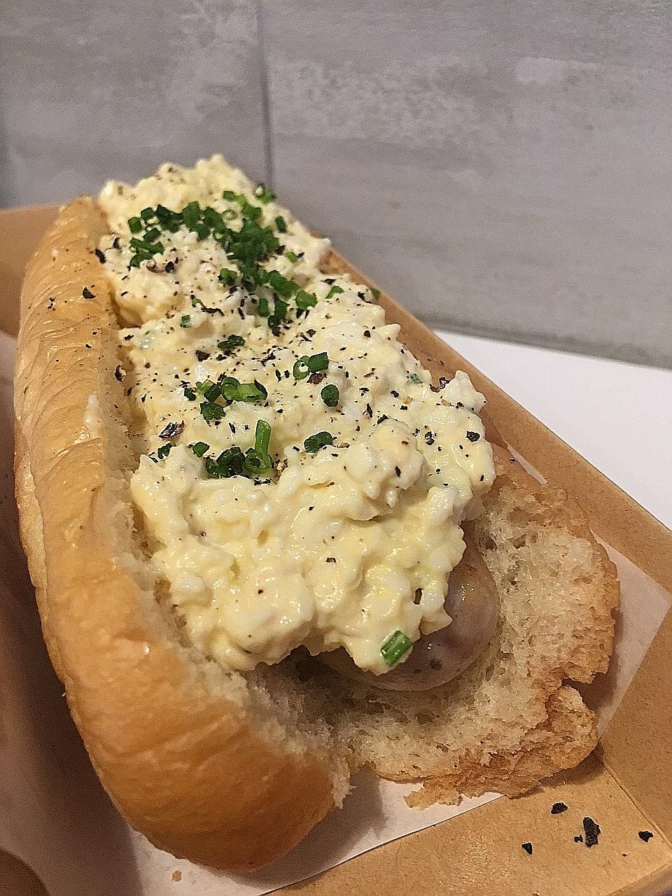 The truffle egg mayo pork hotdog ($6.90) comes with a generous amount of creamy egg mayonnaise that covers the sausage entirely.