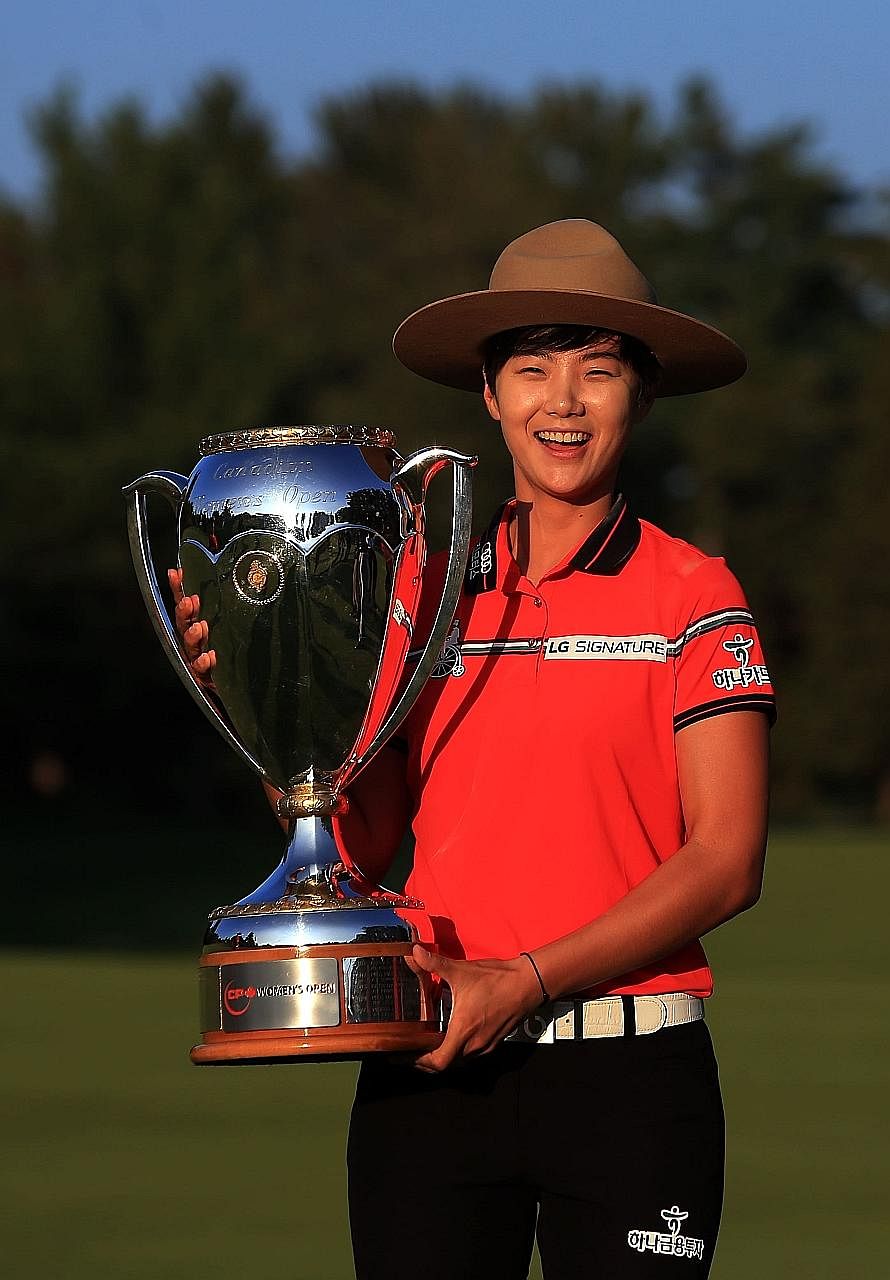 US Women's Open champion Park Sung Hyun celebrating with her other trophy in August, the Canadian Pacific Women's Open. The South Korean is primed to become the fourth world No. 1 in women's golf this year.