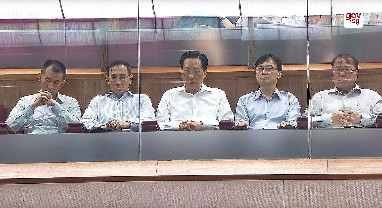 Present in Parliament yesterday were (from left) SMRT Trains chief executive Lee Ling Wee, SMRT chief executive Desmond Kuek, SMRT chairman Seah Moon Ming, LTA chief executive Ngien Hoon Ping and LTA deputy chief executive Chua Chong Kheng. Transport