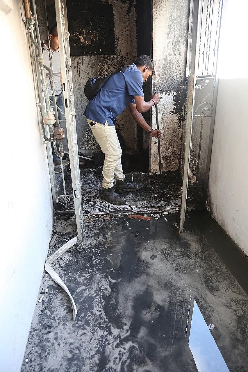 The fire which broke out in a fifth-floor rental unit in Tampines is believed to have started from a storage cabinet. It was put out by the SCDF with the use of a water jet.