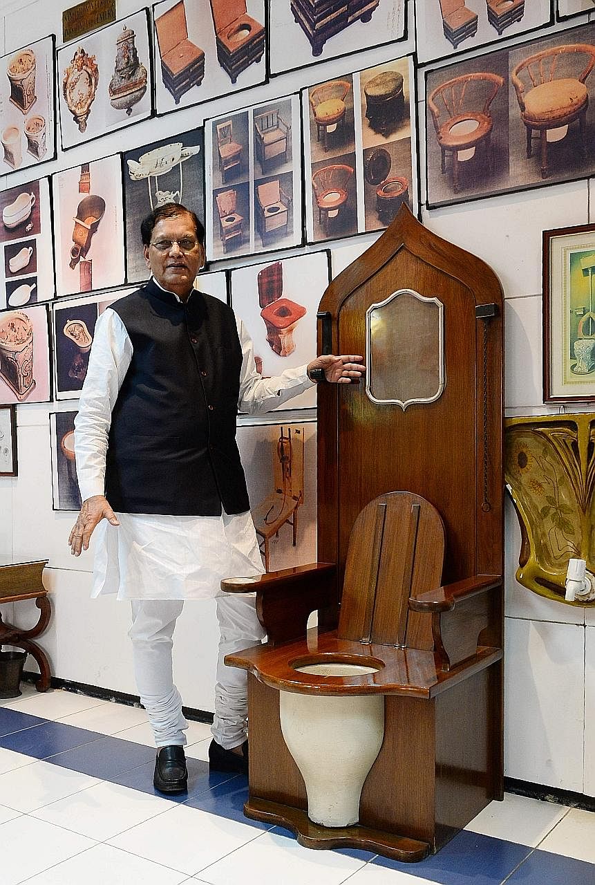Mr Bindeshwar Pathak, founder of the Sulabh International Museum of Toilets in New Delhi, with a replica of a throne with a built-in commode used by French King Louis XIV. The museum was once named among the world's top 10 wacky museums.