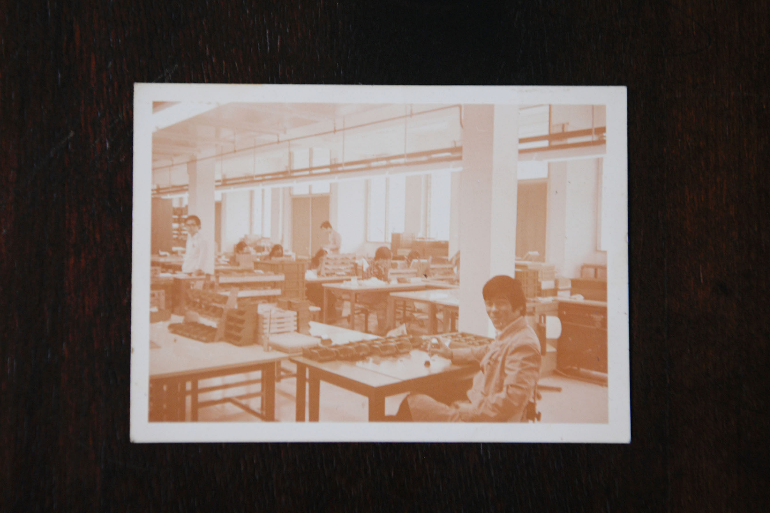 Mr Chong Nam Soy when he was a supervisor at the Rollei factory in the 1970s. The company, which produced optical instruments, was seen as one of the "best companies" to work at in Singapore, he said. Mr Chong, 68, wearing his old Rollei uniform and 