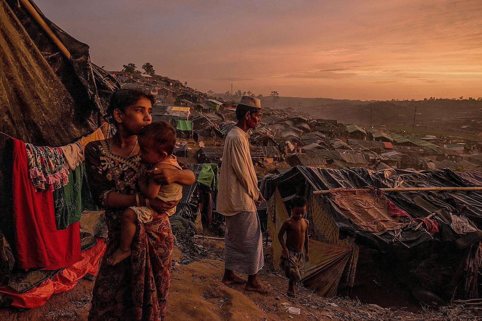 Rohingya refugees in a makeshift camp in Cox's Bazar, Bangladesh, on Wednesday. The US has declared the violence against Myanmar's Muslim minority in Rakhine an act of "ethnic cleansing" and Mr Rex Tillerson said it will pursue accountability through