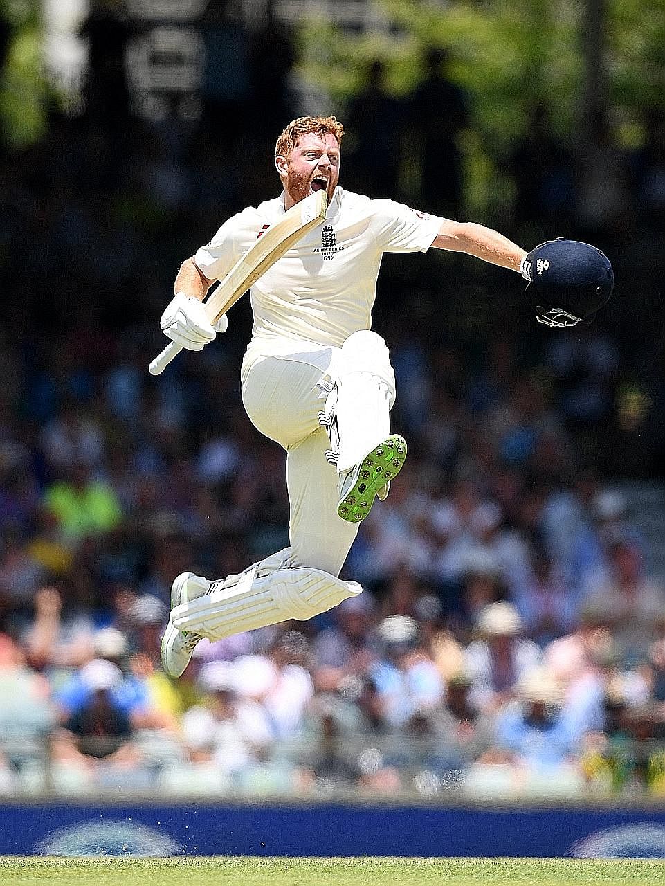 Above: Bairstow celebrating his century, before England lost their last six wickets for just 35 runs, going from 368 for four to all out for 403.
