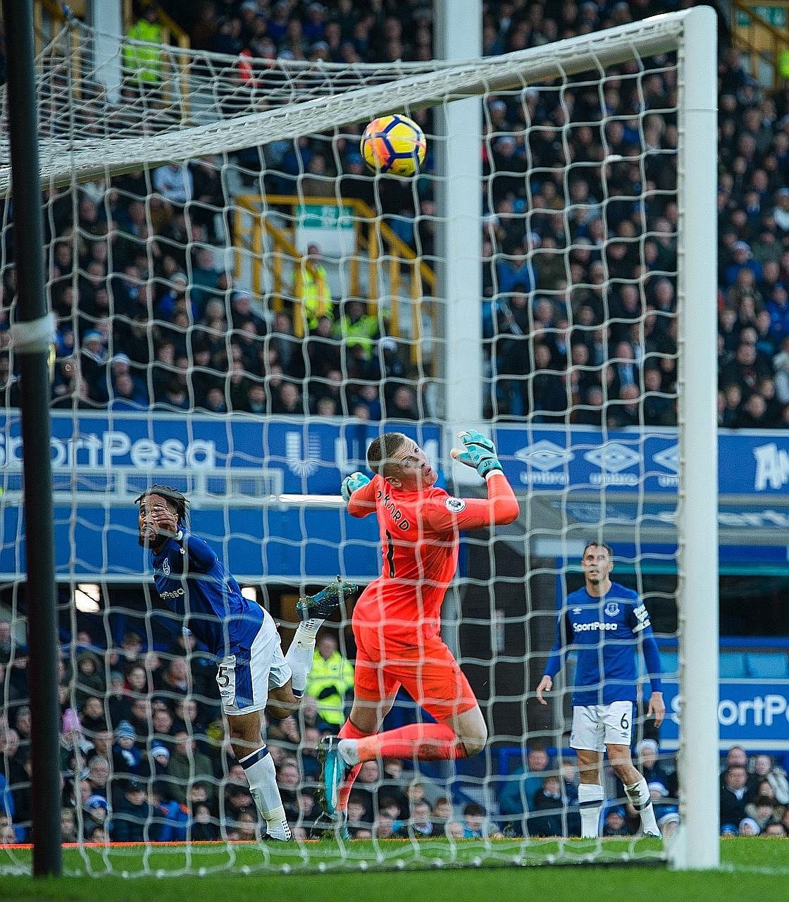 Everton centre-back Ashley Williams giving his team a fright by heading against his own crossbar in an attempt to clear the ball in the second half on Saturday. The Toffees shut up shop to keep out a toothless Chelsea side missing their No. 1 striker