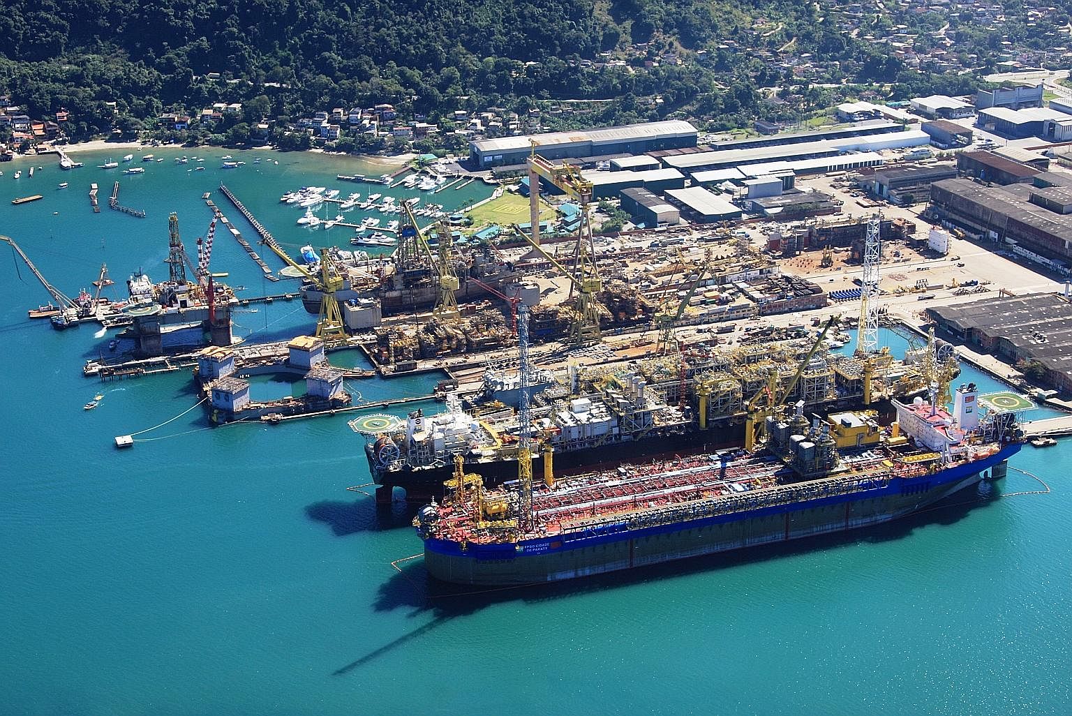 Keppel's shipyard in Brazil. Keppel O&M has said it will continue its operations in Brazil, despite having to pay US$422 million (S$567million) in fines as part of a global resolution for a corruption probe across three jurisdictions in Singapore, Br