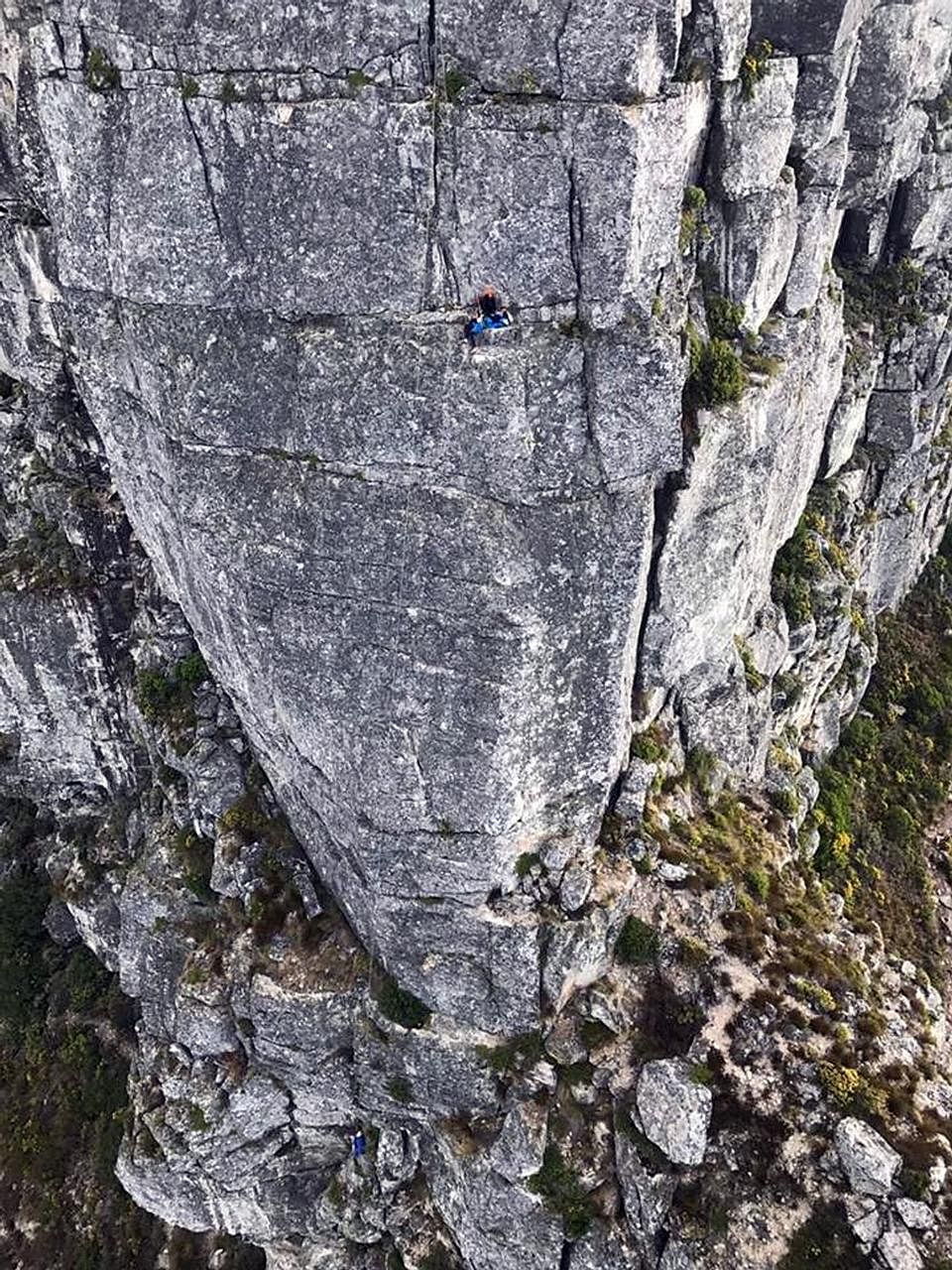 A climber receiving CPR by the side of Table Mountain in Cape Town, South Africa, on Monday. Hundreds of tourists were stranded during the 12-hour rescue operation involving 30 rescuers.