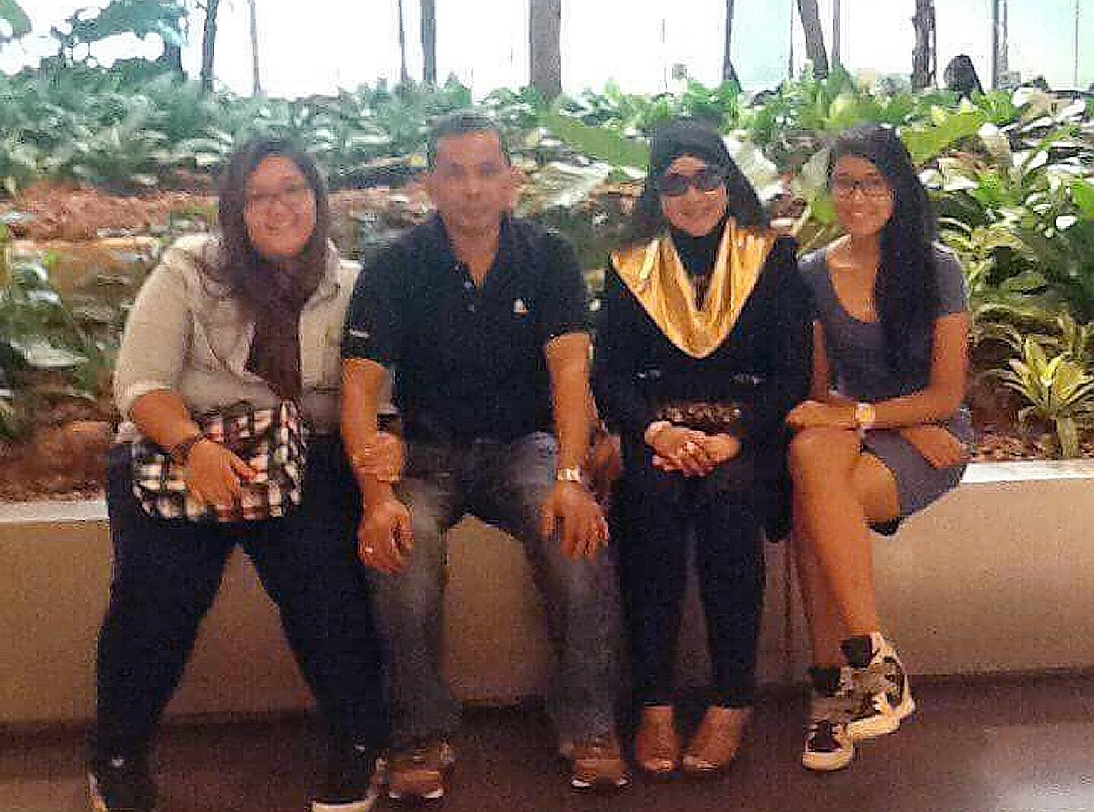 (From left) Ms Nur Amalina Rosli; her father, Mr Rosli Samad; her mother, Madam Maimunah Sapari; and her sister, Ms Dayana Sarah Rosli. The four were killed after a tipper truck crushed the car they were occupying in the Malaysian town of Port Dickso