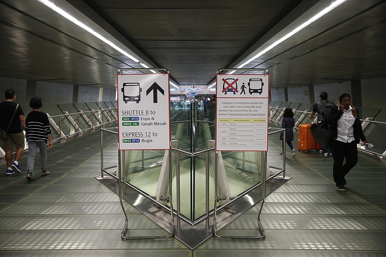 Signage at the link bridge above Changi MRT station informing commuters about the shorter operating hours on the weekends this month and full closures on two Sundays.